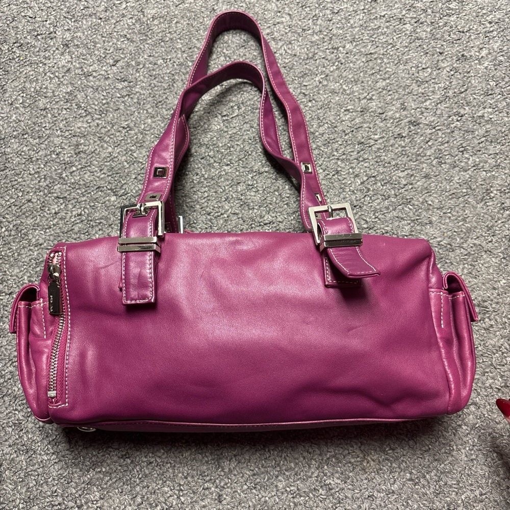 Purple leather bag with silver hardware